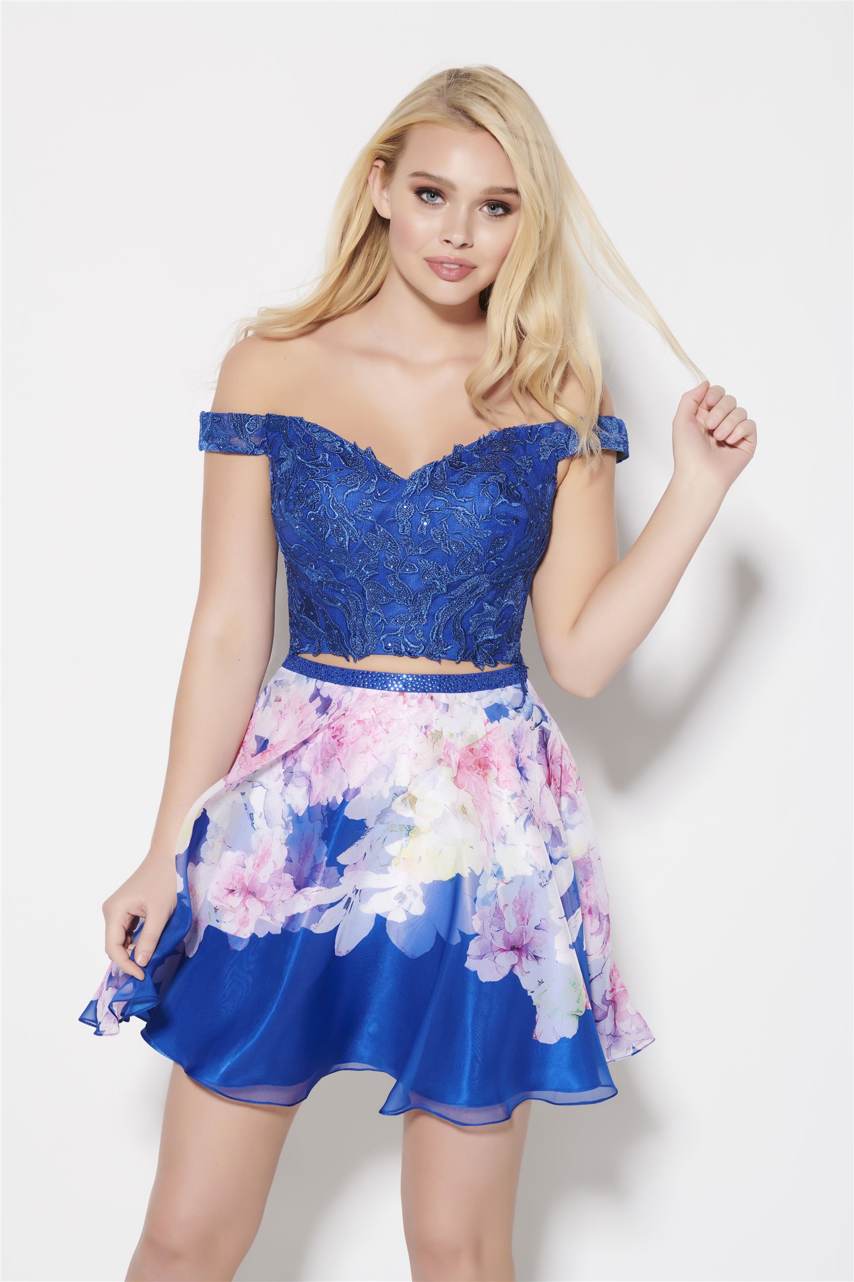 Blonde girl in blue two piece homecoming dress